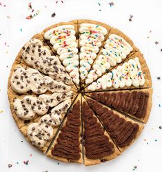 an assortment of cookies and pastries arranged in a pie