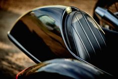 two black motorcycles parked next to each other