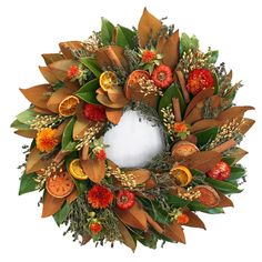 a wreath with oranges, strawberries, and other autumn decorations on it's sides