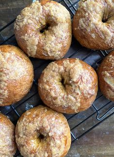 freshly baked doughnuts cooling on a wire rack