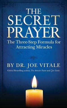 the secret prayer book with a lit candle