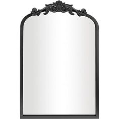 an ornate mirror on a white background