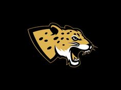 the jacksonville tigers logo on a black background with an orange and white cheetah