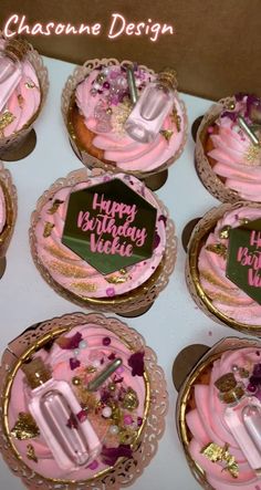 pink frosted cupcakes with happy birthday wishes on them