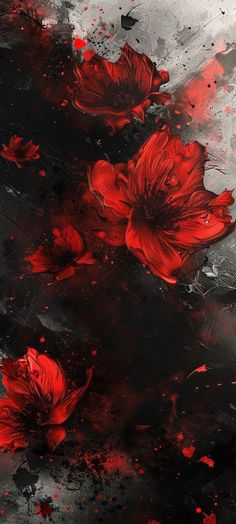 red flowers are floating in the water on a black and white background with splashes