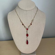 Nwt Absolutely Stunning Gold Tone Necklace With Red Acrylic And White Rhinestone Accents. Length: 16-19.5 Inches Drop: 3 Inches Red Silver Necklace, Elegant Red Rhinestone Necklace, Elegant Red Rhinestone Necklace For Formal Occasions, Elegant Red Rhinestone Necklace For Formal Events, Elegant Red Lariat Necklaces, Elegant Red Lariat Necklace, Money Necklace, Prom Necklace, Gold Drop Necklace