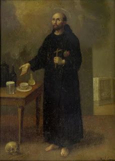 a painting of a man with a cross in his hand and a skull on the table