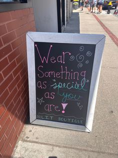 Retail chalkboard sign with the words “wear something as soecial as you are” written on it. Retail Chalkboard Signs, Chalkboard Sayings, Urban Market, Small Chalkboard Signs, Spring Window Display