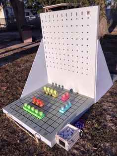 a board game set up in the grass