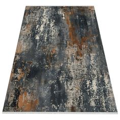 an area rug with various colors and patterns on it, including brown, black, gray and white