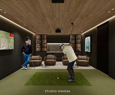 two men are playing golf in a living room with green carpet and wood ceilinging