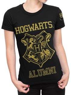 PRICES MAY VARY. Ladies Hogwarts T-shirt With a cool golden print of the Hogwarts emblem and the words 'Hogwarts Alumni', noone will think you are a muggle A perfect gift for any fan of the Harry Potter series This awesome Harry Potter Fitted Tee is ideal to wear year round and looks nicely paired with Jeans or Leggings Officially licensed Harry Potter merchandise Ladies Harry Potter T-shirt. Feel like part of the Wizarding World in this awesome Hogwarts T Shirt! A great addition to the wardrobe Hogwarts T Shirt, Harry Potter Pyjamas, Harry Potter Tee, Harry Potter T Shirt, Hogwarts Alumni, Harry Potter Tshirt, Harry Potter Shirts, Harry Potter Merchandise, Harry Potter Outfits