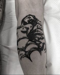 a man's arm with an eagle tattoo on it