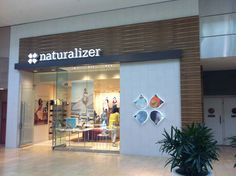 the entrance to a store that sells naturalizer products