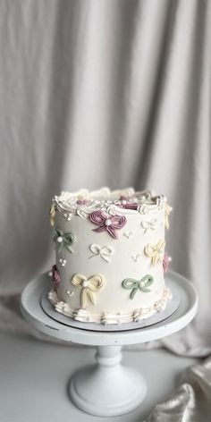 a white cake sitting on top of a table