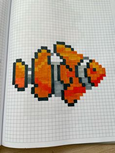 an open book that has some type of pixel art on it