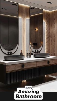 a modern bathroom with two sinks and mirrors