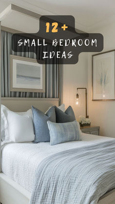 a bed with white sheets and blue pillows on it in front of two framed pictures