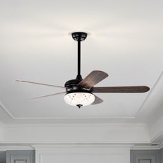 a ceiling fan is hanging from the ceiling