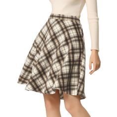 This skirt is timeless thanks to the plaid prints and easy a-line silhouette. Add plaid patterns to your transitional wardrobe with the skirt. It is made to sit high on the waist with an elasticated waistband for a flattering silhouette. Team yours with a chunky knit jumper and Chelsea boots for a versatile work-to-weekend style. You can pair this skirt with boots and overcoats for a warmer outfit. These fashionable clothes for women can not only be worn daily but can also be easily matched as a Skirt With Boots, Skirt Outfits Fall, Chunky Knit Jumper, Skirts With Boots, Weekend Style, Fall Skirts, Warm Outfits, Plaid Skirt, Chic Woman