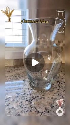 a glass vase sitting on top of a counter