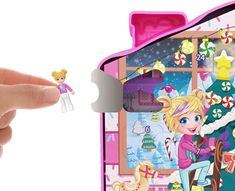 a hand is holding an open toy case