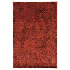 an orange and black rug with ornate design on the bottom, in front of a white background