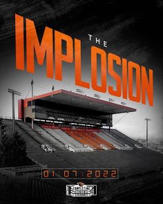 the implosion stadium with an orange and black sign that reads,'the implosion '