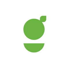 a green apple sitting on top of a plate