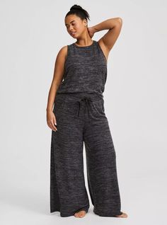 Matching Style(s): Search 11783 FIT Model is 5'8” wearing size 1. Measures 28” from shoulder (size 2). MATERIALS + CARE Super Soft Plush by Torrid™️ knit fabric: A warm, breathable fabric that’s extra cozy and comfy. Stretch level: Maximum. 48% polyester, 48% rayon, 4% spandex. Machine wash cold. Line dry. . Imported. DETAILS Crewneck. . Sleeveless. . The best plus size women's supersoft plush lounge tank sleep tops & dresses in black heather made of supersoftplush. These comfy pajamas will be y Plus Size Lounge Wear Outfit, Wide Leg Lounge Pants, Plus Size Pajamas, New Street Style, Pajamas Comfy, Swimming Outfit, Bra And Panty Sets, Matches Fashion, Trendy Plus Size