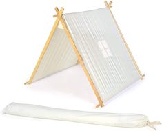 a white tent with two wooden poles and a piece of fabric