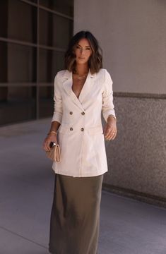 Expertly crafted with shoulder pads, faux pockets, and an oversized fit, the Elegant Evening Blazer exudes luxurious style and sophistication. Its structured silhouette adds a touch of elegance to any ensemble, making it a perfect choice for any formal event or special occasion. Fabric 100% polyester Feminine Semi-formal Spring Blazer, Chic Structured Office Blazer, Elegant Fall Blazer For Office, Elegant Double-breasted Blazer For Work, Formal Beige Blazer With Double Button Closure, Chic Tailored Blazer For Formal Occasions, Tailored Cream Blazer With Pockets, Chic Formal Blazer With Double Button Closure, Formal Beige Double-breasted Blazer Dress