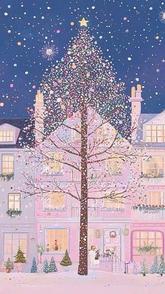 a christmas tree in front of a pink building