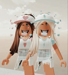 two girls wearing hats and holding hands in front of a sky with hearts on it