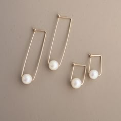 Elegant and classic, these earrings add a glowing touch to you look, without stealing the show. Akoya pearls are cultured in saltwater, and have a brilliant luster and smooth, spherical shape. Latch closure keep your pearls in place while getting down on the dance floor. Limited availability! 1/4" diameter Akoya pearls Choice of sterling silver or 14k gold fill. Choice of 3/4" length or 1 1/2" length. Pearl Earring Designs Unique, Wire Pearl Earrings, Diy Wedding Earrings, Journaling Activities, Diy Earrings Pearl, Diy Pearl Earrings, Casual Pearls, Modern Pearl Earrings, Modern Pearl Jewelry