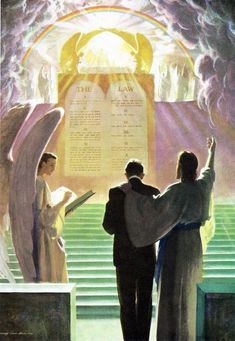 two people standing in front of an angel