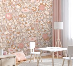 a living room scene with focus on the table and wallpapered area that is decorated in pastel tones