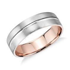 two tone gold and silver wedding ring with satin finish inlayed to the center