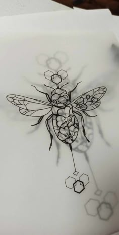 a drawing of a bee with honeycombs on it