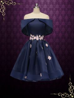 Elegant navy short formal dress with cherry blossom lace applique. Approx 36 inches measured from hollow to hem Photoed in navy, can also be made in another color Bra paddings and boning in the bodice Zipper Working Time: 6-8 weeks Rush Order or customization please inquire prior to order. Custom Designs We specialize in custom design services.If there's a dress you like and it's not on our website,you're more than welcome to email us a picture of the dress for a quote. Navy Blue Formal Dress Short, Short Red Dress Formal, Vtuber Ideas, Navy Blue Formal Dress, Cherry Blossom Dress, Quinceañera Ideas, Navy Blue Cocktail Dress, Quince Decorations, Fashion Dresses Formal