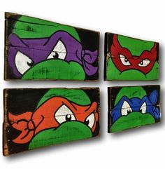 four pieces of wood painted with teenage mutant ninja turtles on them, each featuring different colored faces