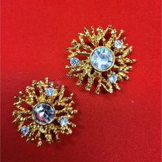 Kenneth Jane Lane For Avon Regal Riches Collection Clip On Earrings Signed Kjl. Pre- Owned By A Collector. Unused. In Original Box Packaging. In Great Condition As Shown In Pictures. Vintage From The 1990s. An Elegant Vintage Kjl Rhinestone Cluster Clip On Earrings. Kjl Collection "Regal Riches" From 1992 Kenneth Jay Lane For Avon. Stunning Textured Gold Tone Metal With Three Clear Color Crystals. Features: Earrings 1.5 X 1.5 In Condition: Pre-Owned Like New Festive Sparkling Gold Earrings, Festive Gold Sparkling Earrings, Jane Lane, Vintage Clown, Kenneth Jay Lane, Gold Texture, Earrings Collection, Color Crystal, Music Box