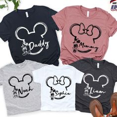 three shirts with mickey mouse heads on them and one has the word disney in it