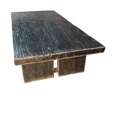 a wooden table with two drawers on it's sides, against a white background