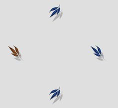 three blue and brown feathers flying through the air on a gray background with white space for text