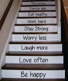 some stairs with words painted on them