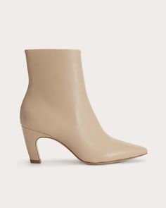 A boot that’s ahead of the curve. It’s the ankle boot like you’ve never seen it before. Swooping lines give this style an artistic sense of sophistication. Crafted from soft Nappa leather with a soft pointed toe and secret side zips for easy on-off, it’s the ideal balance of form and function. This boot uses leather sourced from a tannery rated Gold by the Leather Working Group (LWG)—the highest rating a tannery can receive for demonstrating best practices in environmental compliance and pe Dramatic Essence, Ethereal Dramatic, Soft Summer Palette, Winter Wishlist, Summer Palette, Soft Summer, Flat Sneakers, Fashion 2024, Fall 2022