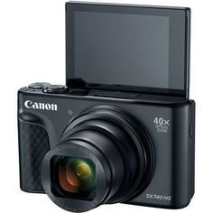 a digital camera is shown with the lens up