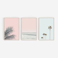 three palm trees and two surfers on the beach in pink, blue, and green