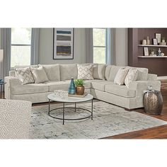 a living room scene with focus on the sectional sofa